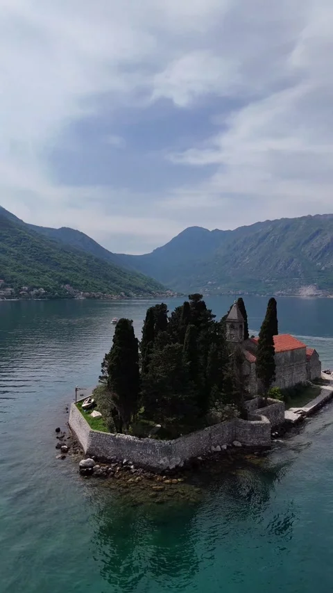 Our Lady of the Rocks islets on the coast of Perast .Vertical video Stock Footage 300760603