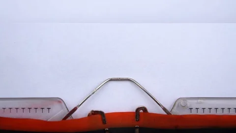 Our Loses - phrase printed on an old typewriter in red letters, close up. Stock Footage 126644440
