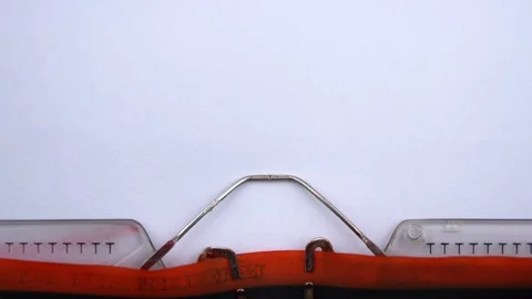 Our strategy - phrase printed on an old typewriter in red letters, close up. Stock Footage 126644371