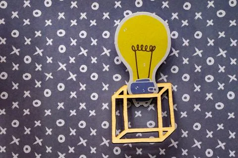 Out of the box lightbulb Stock Photos