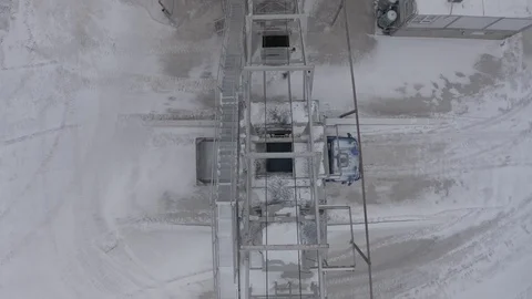 Out from close up of bituminous concrete conveyor Stock-Footage 129639305