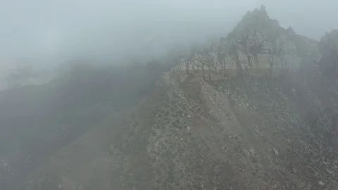 Out of Clouds Mountain Reveal Drone Video stock 127250249