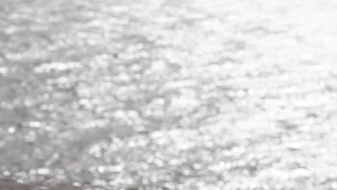 Out of focus abstract  slow motion background of shimmering sea water surface Vídeo Stock 156936538