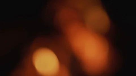 Out of focus background blur of flames in fire place Stock Footage 128389553