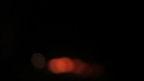 Out of Focus Car Headlights On Dark Highway Night Abstract Video stock 328231117
