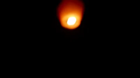 Out of focus Chinese Lantern floating away Stock Footage 65645427