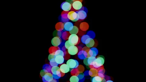 Out of Focus Christmas Tree Lights Over Black Background - Blurred Video stock 144046076