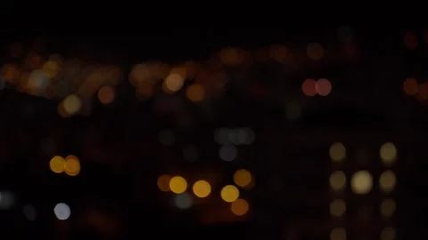 Out of Focus City Lights Creating Bokeh Effect at Night Vídeo Stock 310335212