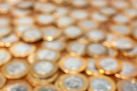 Out of focus coins for background Stock Photos