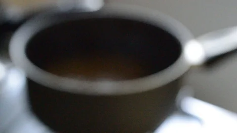 Out of focus concept - pan on the stove at two angles Stock Footage 114776825