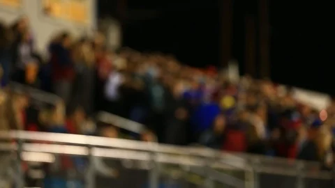 Out of Focus crowd at High School Football game on a Friday Night Video stock 96322882