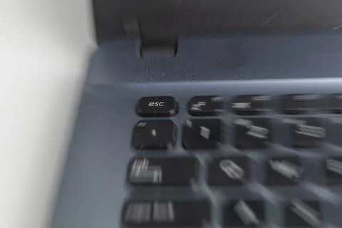 Out of focus esc key button Stock Photos