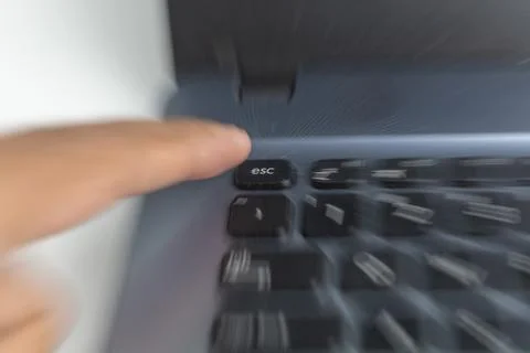 Out of focus esc key button Stock Photos