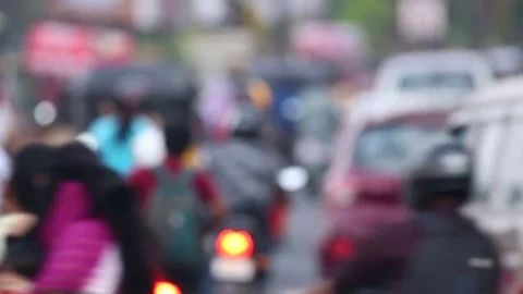 Out of focus evening rush hour traffic India Stock Footage 73348050