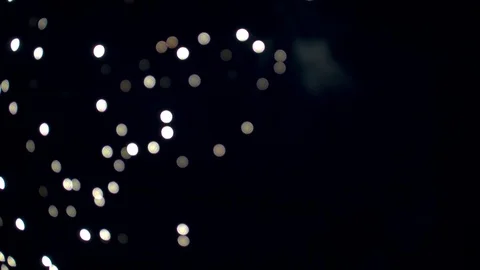 Out of Focus Firework Exploding and Glittering Across the Sky Stock Footage 92450609