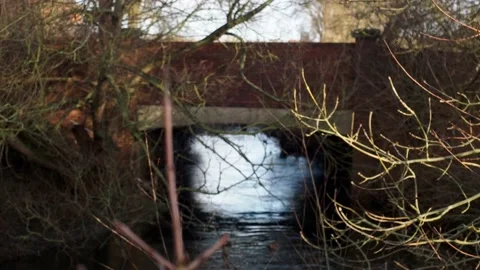 Out of focus to in focus of the Crow Mills Bridge Stock Footage 229653447