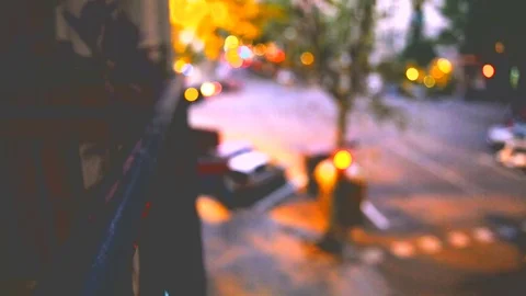 Out of focus to focus shot of, at twilight, in a busy street, Eixample Barcelona Stock Footage 83038180