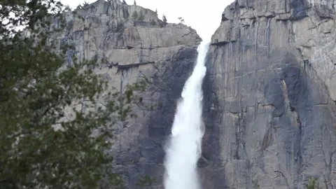 Out of focus to in focus: water cascading over Upper Yosemite Falls Stock Footage 241194094