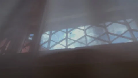 Out of focus geometric window pattern casts diffused blue and red light thr.. Stock Footage 314608334