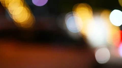 Out of focus glittery lights at night as background Stock Footage 140863204