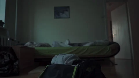 Out of focus Guys dresses up, bring the sporty clothes from a gym bag. Stock Footage 130759837
