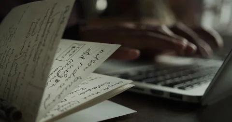 Out of focus hands type on a keyboard Video stock 136761584