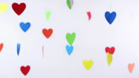 Out of focus hanging hearts 스톡 동영상 55106935