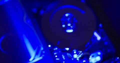 Out of focus hard drive and hard disk, under blue light. Technology for storage Stock Footage 132081144