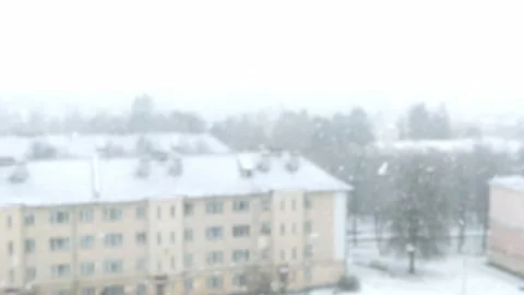 Out of focus. Heavy snow is falling outside the window. Stock Footage
