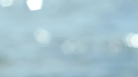 Out of focus highlights reflected off sea water Video stock 105644712