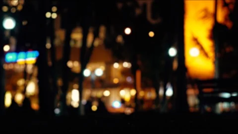 Out of focus lights and lens flares of a street at night. 스톡 동영상 105350872