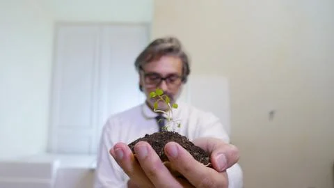 Out of focus man growing concept Stock Photos