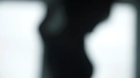 Out of focus modern contemporary dancer dancing backlit by windows 스톡 동영상 104272846
