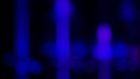 Out of focus moving light at night. Stock Footage 79228063