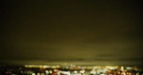 Out of focus nighttime view of DTLA from Griffith Park in Los Angeles, Stock Footage 115100909