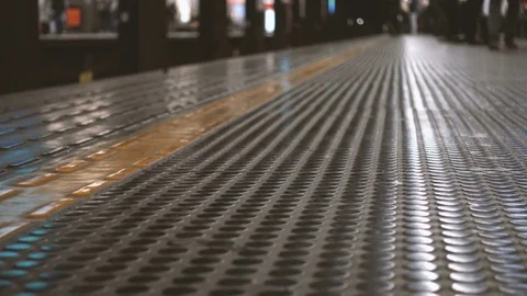 Out of focus people on the platform of a subway station Stock Footage 71374402