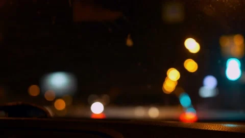 Out of focus road lights. View of the night road where cars move and lights Stock Footage 200843394
