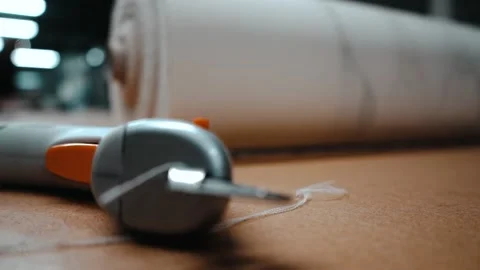 Out of focus rolling out of the material Stock Footage 135160635