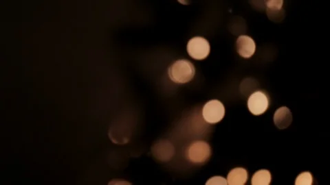 Out of focus. Scroll of blurred lights on a black background Stock Footage 99874419