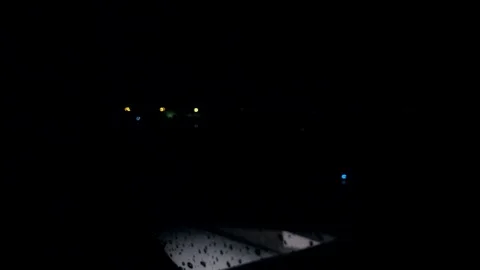 Out of focus shot of plane taking off Stock Footage 99359966