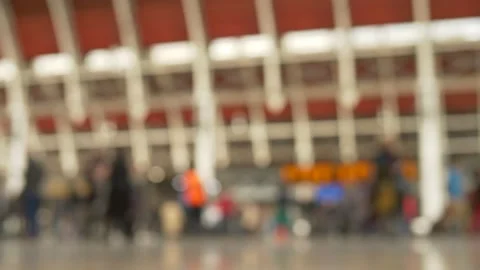 Out of focus slow motion passengers at London Paddington station 4K Stock Footage 201222693