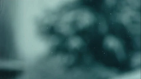 Out of Focus Snow Falling In Slow Motion Stock Footage 73338613