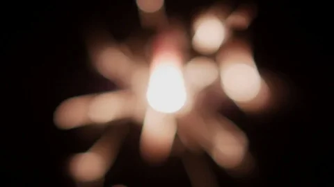 Out of focus sparkler burning Stock Footage 84966109