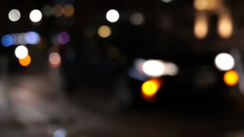 Out of focus traffic driving through city at night time- New York City, NY Stock Footage 234070862