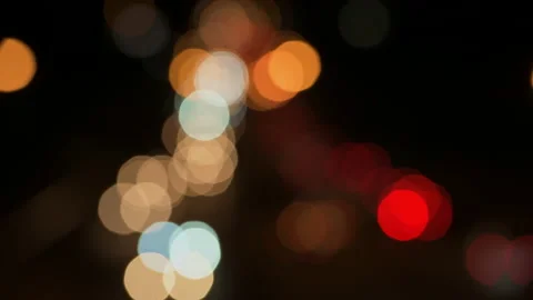 Out of focus traffic lights at night - stock video Stock Footage 236763583