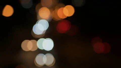 Out of focus traffic lights at night - stock video Stock Footage 236795589