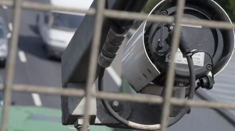 Out of focus traffic with speed camera Stock Footage 39458592