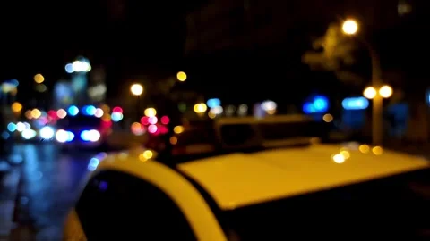 Out-of-focus view of an incident scene at night Stock-Footage 317239678
