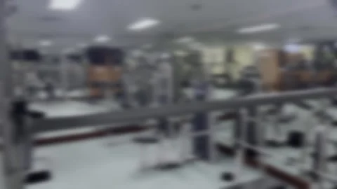 Out of Focus view of a modern gym with exercise equipment Stock Footage 304093328