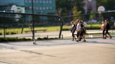 Out of focus view of public city basketball court Video stock 117360922
